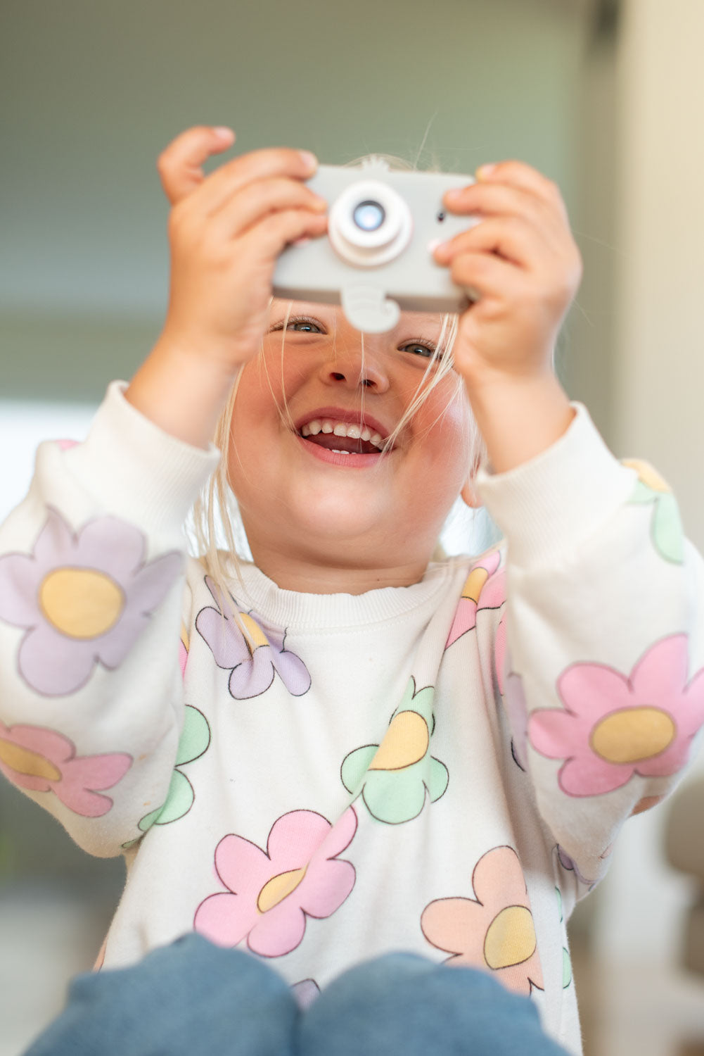 elephant digital kids camera, child is laughing while taking pictures