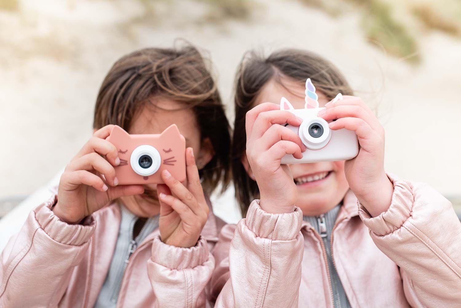 zoo friends cat and unicorn digital kids cameras, children are taking pictures at the beach