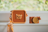 odalsilicon bear bag and urban zoo bear digital kids camera, standing on the windowsill