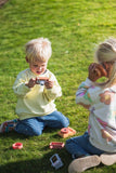 odalowl digital kids camera, children are playing in the garden with the camera and walki talki