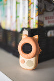odalzoo walkie talkie fox, standing in kidsroom in front of books