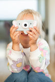 odalelephant digital kids camera, child is holding the camera into its hands