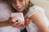 odalperiwinkle the unicorn digital kids camera, child is showing the camera to other child