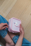 odalUnicorn Bag for pink Periwinkle the Unicorn digital kids camera, child is closing the bag