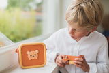 odalbear bag for yogi the bear digital kids camera, child is looking at the bag while holding the camera