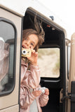 odalzoo friends giraffe digital kids camera, children are standing in a car, holding the giraffe and elephant cameras