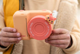 odalzoo print fox digital kids camera, child is holding the camera with lenscover