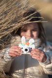 odalzoo friends rabbit flower digital kids camera, child is holding the camera in its hands