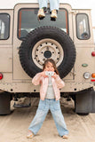 odalzoo friends elephant digital kids camera, child is holding the camera while standing at the back of a jeep
