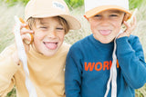 odalwalkie talkie bear set, children are playing with the walkie talkies while making funny faces